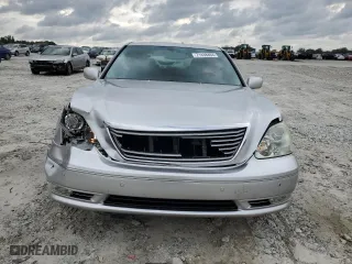 2004 Lexus LS 430 with VIN JTHBN36F440129256, listed as a Copart auction lot 71438464 with 129,287 mi miles and Salvage Title. Bid and sale history available at carsss.com. Image 5.