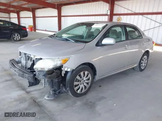 2012 Toyota Corolla L with VIN 2T1BU4EE8CC892968, listed as a IAAI auction lot 42014605 with 196,245 mi miles. Bid and sale history available at carsss.com. Image 2.
