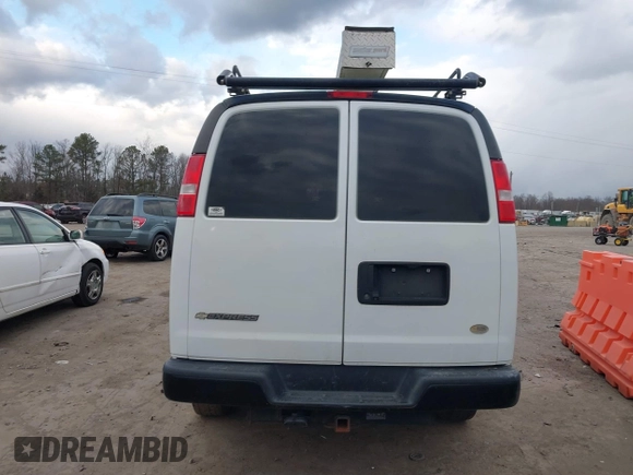 2017 Chevrolet Express Cargo Van with VIN 1GCWGBFG4H1348685, listed as a IAAI auction lot 41234959 with 215,067 mi miles. Bid and sale history available at carsss.com. Image 16.