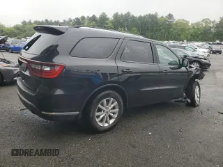 2023 Dodge Durango SXT with VIN 1C4RDHAG5PC634936, listed as a Copart auction lot 57282195 with 56,689 mi miles and Salvage title. Bid and sale history available at DreamBid. Image 3.