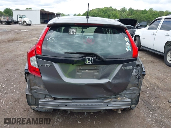2015 Honda Fit LX z VIN 3HGGK5H59FM714352, wystawiony jako IAAI lot #42156097 z przebiegiem 103 587 mil mil oraz . Historia ofert i sprzedaży dostępna na DreamBid. Obrazek 16.
