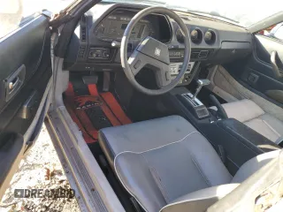 1983 Datsun 280ZX z VIN JN1HZ04S6DX571982, wystawiony jako Copart lot #86317294 z przebiegiem Nie podano mil oraz Tytuł czysty. Historia ofert i sprzedaży dostępna na DreamBid. Obrazek 8.