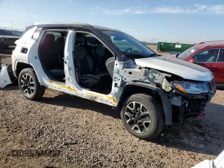 2021 Jeep Compass Trailhawk with VIN 3C4NJDDB9MT511835, listed as a Copart auction lot 63119815 with 79,360 mi miles and Salvage title. Bid and sale history available at DreamBid. Image 4.