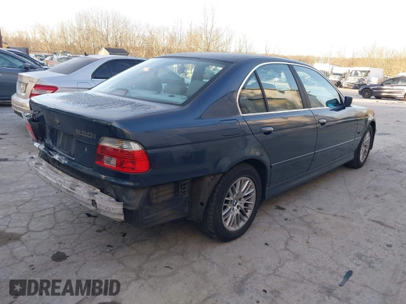 2002 BMW 5 Series 530iA with VIN WBADT63452CH97647, listed as a IAAI auction lot 41258552 with 94,762 mi miles. Bid and sale history available at carsss.com. Image 4.
