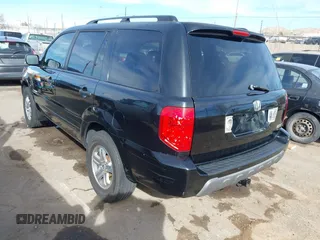 2005 Honda Pilot EX-L with RES with VIN 2HKYF18605H545609, listed as a IAAI auction lot 41626754 with 235,647 mi miles. Bid and sale history available at carsss.com. Image 3.
