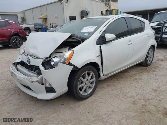 2014 Toyota Prius c One with VIN JTDKDTB31E1559712, listed as a IAAI auction lot 41286514 with 173,321 mi miles. Bid and sale history available at carsss.com. Image 2.
