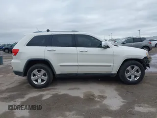 2012 Jeep Grand Cherokee Limited with VIN 1C4RJEBG4CC229571, listed as a IAAI auction lot 41565669 with 221,268 mi miles. Bid and sale history available at carsss.com. Image 13.