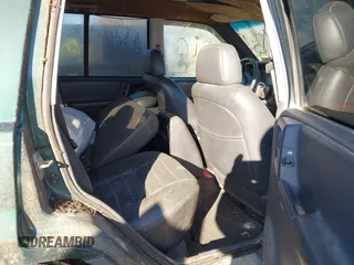 1997 Jeep Grand Cherokee Laredo with VIN 1J4GZ58S2VC605385, listed as a IAAI auction lot 41797715 with 169,996 mi miles and . Bid and sale history available at DreamBid. Image 8.