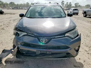 2018 Toyota RAV4 XLE with VIN 2T3WFREV2JW409292, listed as a Copart auction lot 61577355 with 189,258 mi miles and Salvage title. Bid and sale history available at DreamBid. Image 5.
