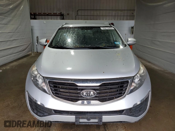 2012 Kia Sportage LX with VIN KNDPBCA22C7333385, listed as a Copart auction lot 55213455 with 160,568 mi miles and Salvage title. Bid and sale history available at DreamBid. Image 5.
