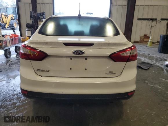2014 Ford Focus SE with VIN 1FADP3F25EL449810, listed as a Copart auction lot 73174364 with 140,031 mi miles and Salvage Title. Bid and sale history available at DreamBid. Image 6.