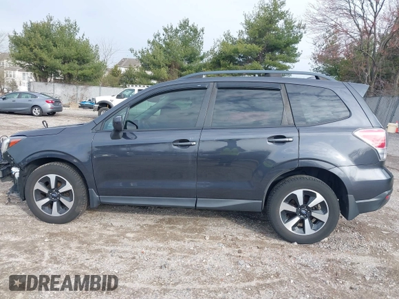 2018 Subaru Forester Premium with VIN JF2SJAGC0JH452501, listed as a IAAI auction lot 41871403 with 65,412 mi miles. Bid and sale history available at carsss.com. Image 14.