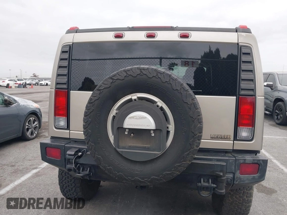 2005 Hummer H2 SUV with VIN 5GRGN23U95H129470, listed as a IAAI auction lot 42046654 with 63,489 mi miles. Bid and sale history available at carsss.com. Image 16.