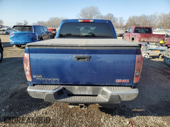 2006 GMC Canyon SLE1 with VIN 1GTDT136968253889, listed as a Copart auction lot 87820665 with 174,803 mi miles and Salvage Title. Bid and sale history available at carsss.com. Image 6.