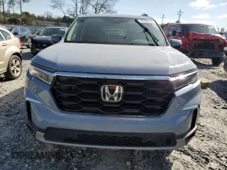 2024 Honda Pilot Touring with VIN 5FNYG2H79RB004803, listed as a Copart auction lot 49702415 with 27,406 mi miles and Salvage title. Bid and sale history available at DreamBid. Image 5.