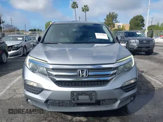 2016 Honda Pilot EX-L with VIN 5FNYF5H57GB038349, listed as a IAAI auction lot 41378569 with 117,651 mi miles and . Bid and sale history available at DreamBid. Image 6.