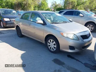 2009 Toyota Corolla with VIN 2T1BU40E99C028401, listed as a IAAI auction lot 42136344 with 163,888 mi miles. Bid and sale history available at carsss.com. Image 1.