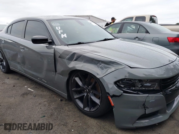 2019 Dodge Charger SXT with VIN 2C3CDXBG6KH667548, listed as a IAAI auction lot 41114669 with 112,233 mi miles. Bid and sale history available at carsss.com. Image 6.
