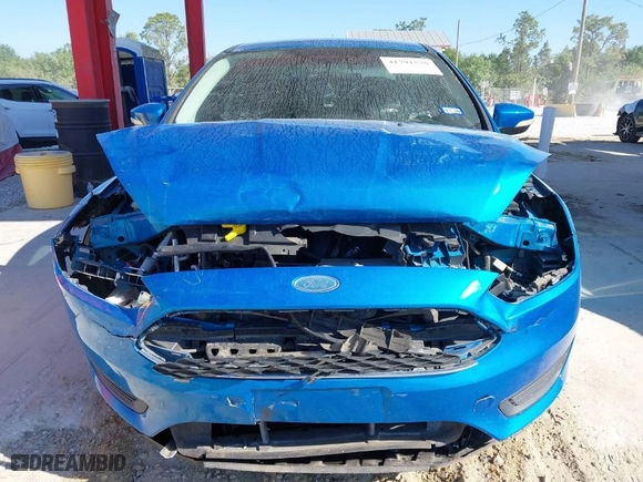 2015 Ford Focus SE with VIN 1FADP3F21FL287269, listed as a IAAI auction lot 41791570 with 122,802 mi miles. Bid and sale history available at carsss.com. Image 6.