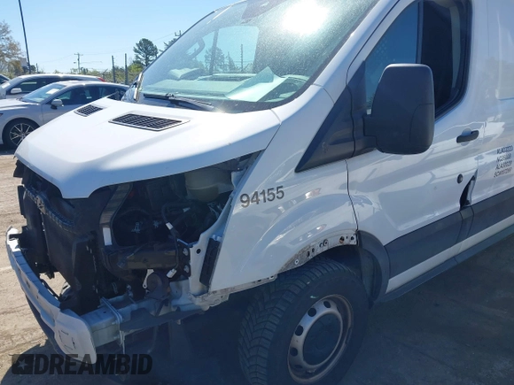 2020 Ford Transit Cargo z VIN 1FTBR1Y84LKB79621, wystawiony jako IAAI lot #41802213 z przebiegiem 89 167 mil mil oraz . Historia ofert i sprzedaży dostępna na DreamBid. Obrazek 18.