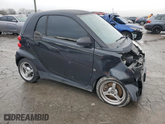 2012 Smart fortwo Pure with VIN WMEEJ3BAXCK568065, listed as a Copart auction lot 84398194 with 73,989 mi miles and Clean title. Bid and sale history available at DreamBid. Image 4.