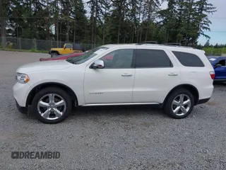 2012 Dodge Durango Citadel with VIN 1C4RDJEG8CC336957, listed as a IAAI auction lot 42309501 with 196,610 mi miles and . Bid and sale history available at DreamBid. Image 14.