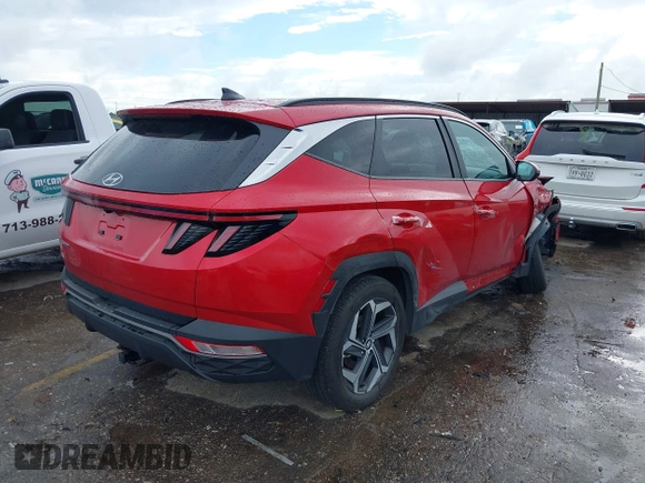 2022 Hyundai Tucson SEL with VIN 5NMJF3AE2NH115088, listed as a IAAI auction lot 41915800 with 13,120 mi miles and . Bid and sale history available at DreamBid. Image 4.