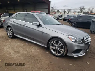 2014 Mercedes-Benz E 350 Sport with VIN WDDHF5KB2EA854735, listed as a Copart auction lot 88583415 with 99,456 mi miles and Salvage title. Bid and sale history available at DreamBid. Image 4.