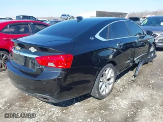 2015 Chevrolet Impala LTZ with VIN 2G1165S31F9220567, listed as a IAAI auction lot 41653330 with 211,891 mi miles. Bid and sale history available at carsss.com. Image 4.