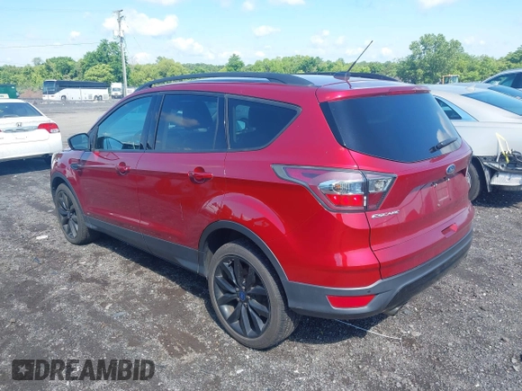 2017 Ford Escape SE z VIN 1FMCU9GD4HUA10240, wystawiony jako IAAI lot #42392522 z przebiegiem 82 325 mil mil oraz . Historia ofert i sprzedaży dostępna na DreamBid. Obrazek 3.