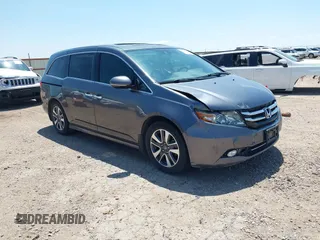 2015 Honda Odyssey Touring Elite with VIN 5FNRL5H96FB051804, listed as a IAAI auction lot 42408761 with 102,598 mi miles and . Bid and sale history available at DreamBid. Image 1.