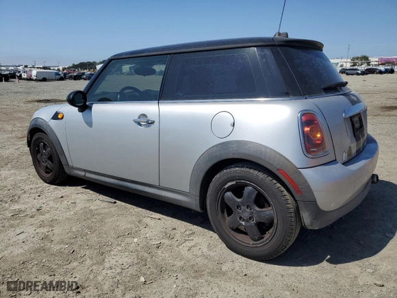 2009 MINI Cooper Hardtop with VIN WMWMF33579TU72374, listed as a Copart auction lot 50092815 with 127,140 mi miles and Salvage Title. Bid and sale history available at carsss.com. Image 2.