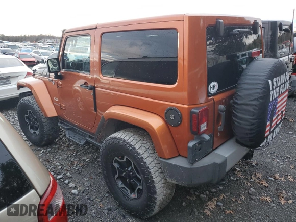 2011 Jeep Wrangler Sahara with VIN 1J4GA5D11BL627667, listed as a Copart auction lot 87227054 with 124,009 mi miles and Clean Title. Bid and sale history available at DreamBid. Image 2.
