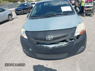 2008 Toyota Yaris with VIN JTDBT923384015057, listed as a IAAI auction lot 41879099 with 184,995 mi miles. Bid and sale history available at carsss.com. Image 13.