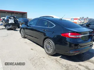 2017 Ford Fusion SE z VIN 3FA6P0HD1HR138693, wystawiony jako IAAI lot #41837634 z przebiegiem 117 638 mil mil oraz . Historia ofert i sprzedaży dostępna na DreamBid. Obrazek 3.