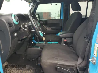 2018 Jeep Wrangler JK Unlimited Sport S with VIN 1C4BJWDG2JL883261, listed as a Copart auction lot 67776984 with 70,508 mi miles and Non Repairable. Bid and sale history available at carsss.com. Image 7.