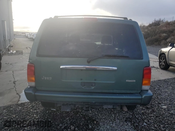 2000 Jeep Cherokee Limited with VIN 1J4FF68S0YL115669, listed as a Copart auction lot 85604524 with 0 mi miles and Salvage Title. Bid and sale history available at carsss.com. Image 6.