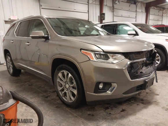 2018 Chevrolet Traverse Premier with VIN 1GNEVJKW0JJ165144, listed as a IAAI auction lot 41129951 with 137,593 mi miles. Bid and sale history available at carsss.com. Image 1.