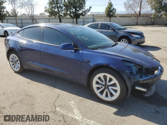 2023 Tesla Model 3 Long Range with VIN 5YJ3E1EB3PF633070, listed as a Copart auction lot 48942545 with 38,332 mi miles and Salvage Title. Bid and sale history available at DreamBid. Image 4.