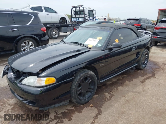 1996 Ford Mustang GT with VIN 1FALP45X0TF133385, listed as a IAAI auction lot 42060901 with 205,228 mi miles and . Bid and sale history available at DreamBid. Image 2.