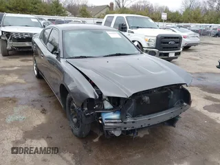 2014 Dodge Charger SE with VIN 2C3CDXBG8EH357664, listed as a IAAI auction lot 41860609 with 94,918 mi miles. Bid and sale history available at carsss.com. Image 1.