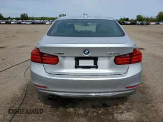 2013 BMW 3 Series 328i xDrive with VIN WBA3B3C5XDF531142, listed as a Copart auction lot 58651745 with 209,990 mi miles and Clean title. Bid and sale history available at DreamBid. Image 6.