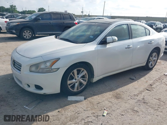 2014 Nissan Maxima SV with VIN 1N4AA5AP6EC446580, listed as a IAAI auction lot 42762381 with 184,665 mi miles and . Bid and sale history available at DreamBid. Image 2.