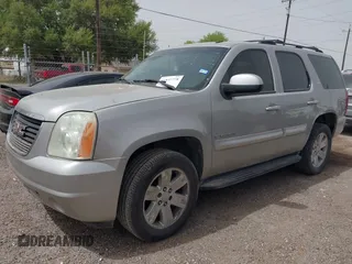 2007 GMC Yukon SLT with VIN 1GKFK13007J115065, listed as a IAAI auction lot 41837778 with 234,917 mi miles. Bid and sale history available at carsss.com. Image 2.