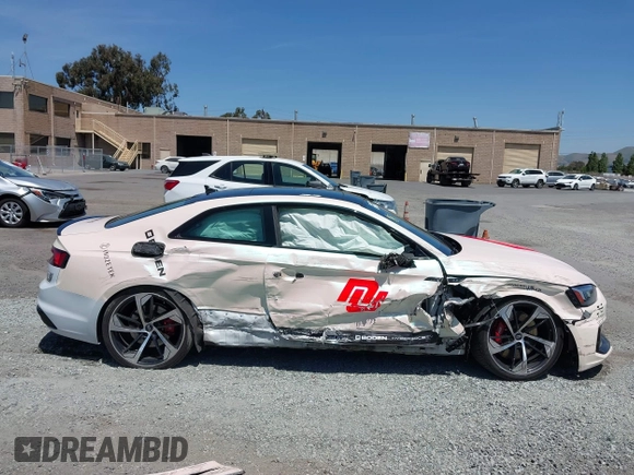 2018 Audi RS 5 z VIN WUAPWAF55JA903152, wystawiony jako IAAI lot #42193996 z przebiegiem 95 730 mil mil oraz . Historia ofert i sprzedaży dostępna na DreamBid. Obrazek 13.