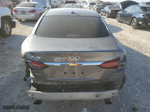 2020 Infiniti Q50 3.0t LUXE with VIN JN1EV7AR9LM256389, listed as a Copart auction lot 79706914 with 74,415 mi miles and Salvage Title. Bid and sale history available at carsss.com. Image 6.