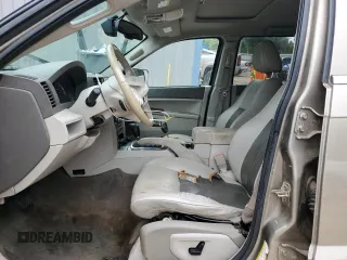 2006 Jeep Grand Cherokee Limited with VIN 1J4HS58N66C211974, listed as a Copart auction lot 60281945 with 220,229 mi miles and Salvage title. Bid and sale history available at DreamBid. Image 7.