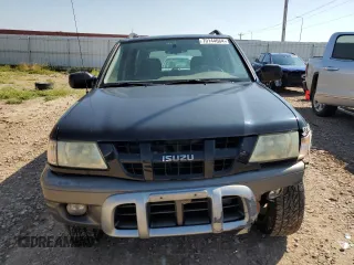 2003 Isuzu Rodeo with VIN 4S2CK58W634313617, listed as a Copart auction lot 70144664 with 179,921 mi miles and Clean Title. Bid and sale history available at DreamBid. Image 5.
