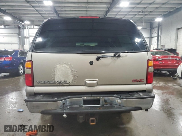 2001 GMC Yukon XL SLT z VIN 3GKFK16T31G182905, wystawiony jako Copart lot #60400425 z przebiegiem 308 919 mil mil oraz Szkoda całkowita • Salvage title. Historia ofert i sprzedaży dostępna na DreamBid. Obrazek 6.