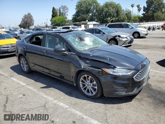 2020 Ford Fusion SE with VIN 3FA6P0HDXLR150768, listed as a Copart auction lot 57085365 with 141,855 mi miles and Salvage title. Bid and sale history available at DreamBid. Image 4.